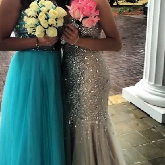 Dresses & Skirts - I'm selling the dress on the right. Worn once.