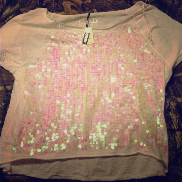 Iridescent sequined white top