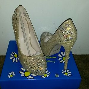 Gold high heels