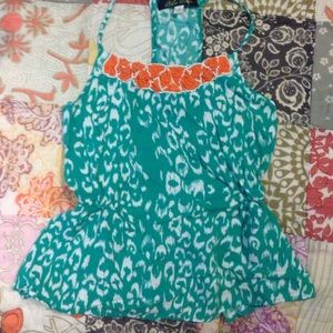 Francesca's turquoise top with orange beading