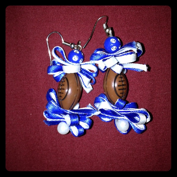 Man made football earrings