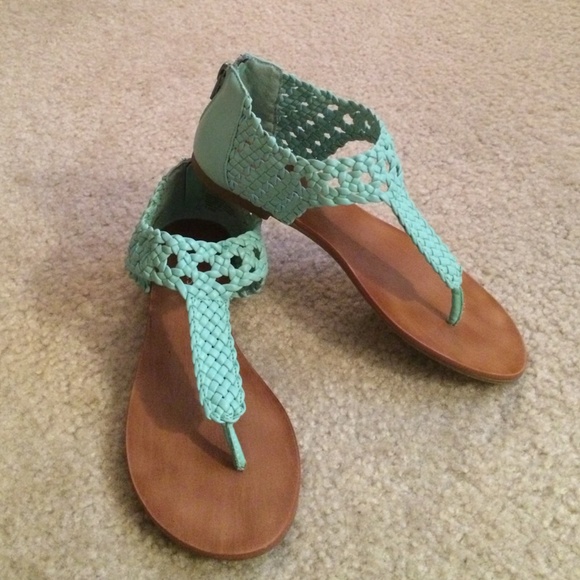 Teal faux leather Nine West Gladiator sandals.