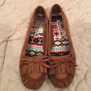 Brown moccasin flats