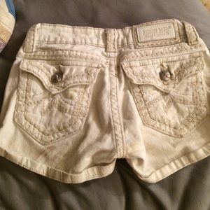 Size 25, White, Denim Brand Miss Me shorts.