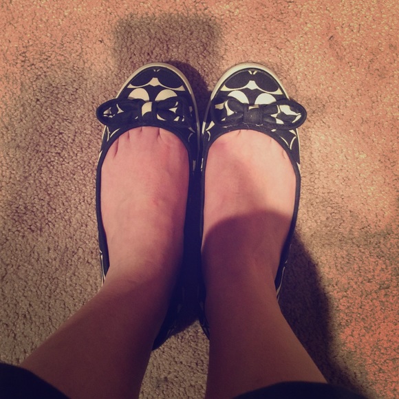 Coach tennis shoes.
