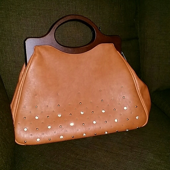 Brown top handle purse