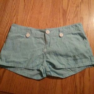 Im selling a pair of striped blue and white shorts