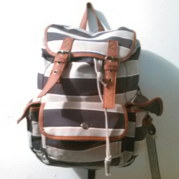 Lady's backpack blue and grey with leather straps