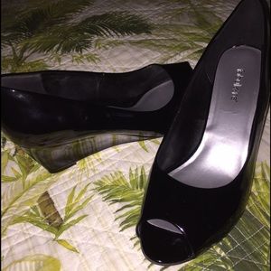 Women's black patent shoes.