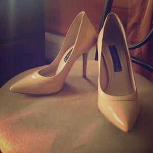 Steven by Steve Madden. Nude patent leather pumps