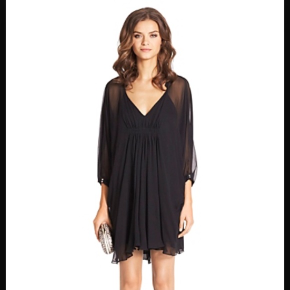 Never before worn DVF black dress, size 8