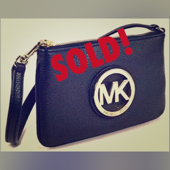 *SOLD on eBay* Authentic MK Medallion Wristlet