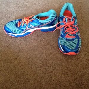 Blue and orange running shoes