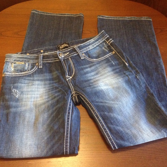 8R distressed Express ReRock boot cut jeans