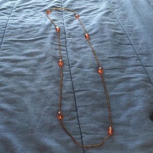Long beaded necklace.