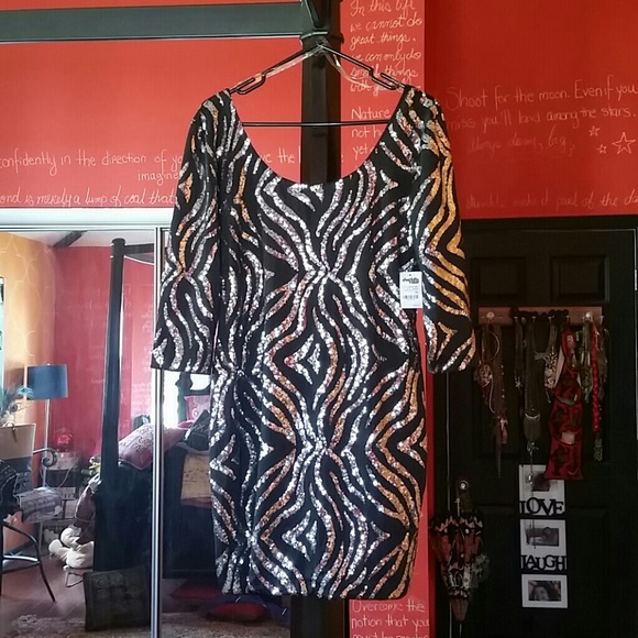 Black body con dress with zebra sequin pattern