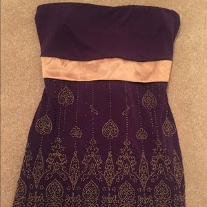 Purple and gold tube top.