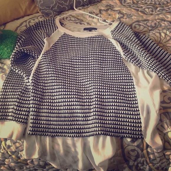 Black and white sweater with white sheer back