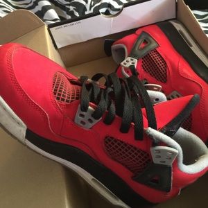 Air Jordan 4s "Toro Bravo"