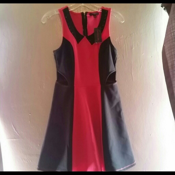 Cut out dress. Black and pink with black studs