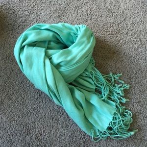 Turquoise scarf.