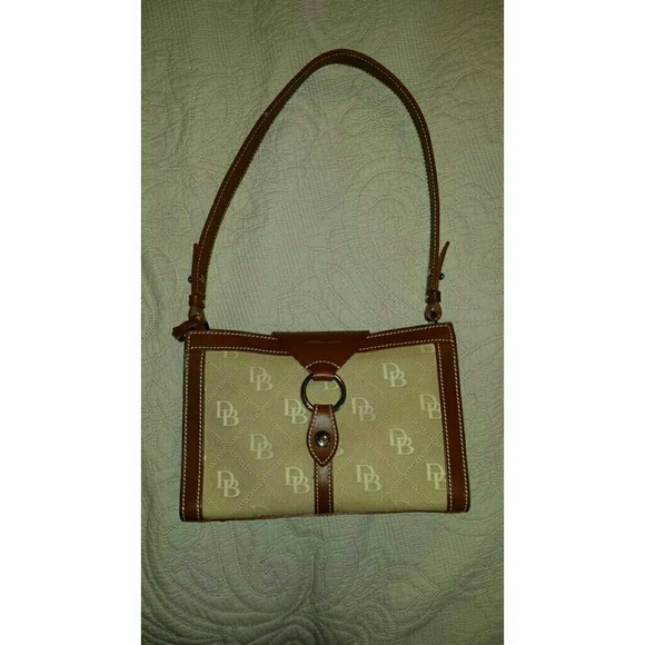 Dooney & Bourke Handbags - *SOLD* Dooney & Bourke O-Ring Flap Shoulder bag