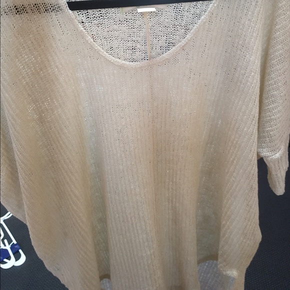 Cream colored oversized doloman shirt