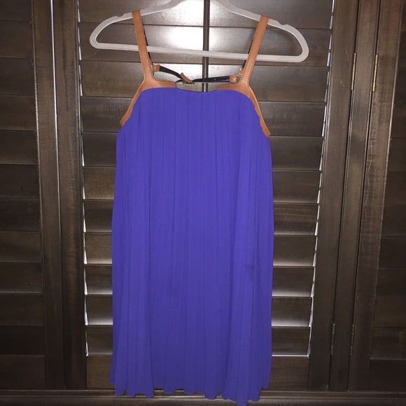 Royal blue pleated dress with faux leather straps
