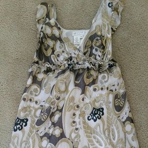 Gold cream and black dress