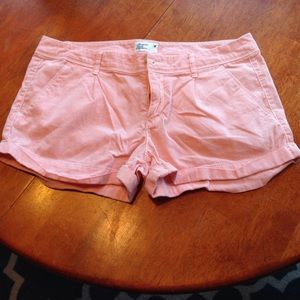 American eagle orange and white striped shorts