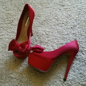 Red peep toe pumps