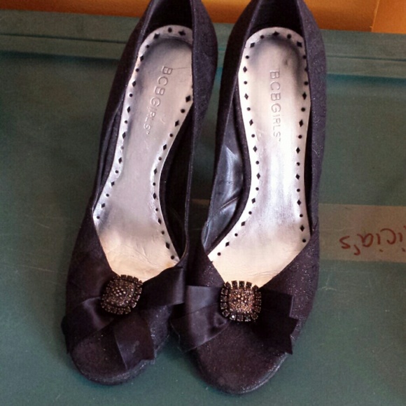 Like new black BCBGirls peep toe pumps