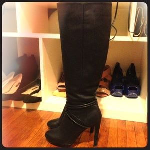 Knee-high black sexy boots