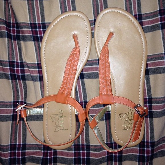 Orange braided sandals