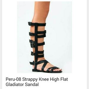 Black strappy gladiator sandals. Wore them once.