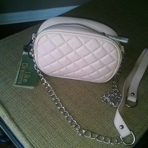 Blush pink quilted faux leather handbag