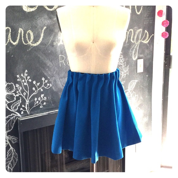 High waisted skirt. Pretty blue with smocked waist