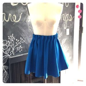 High waisted skirt. Pretty blue with smocked waist