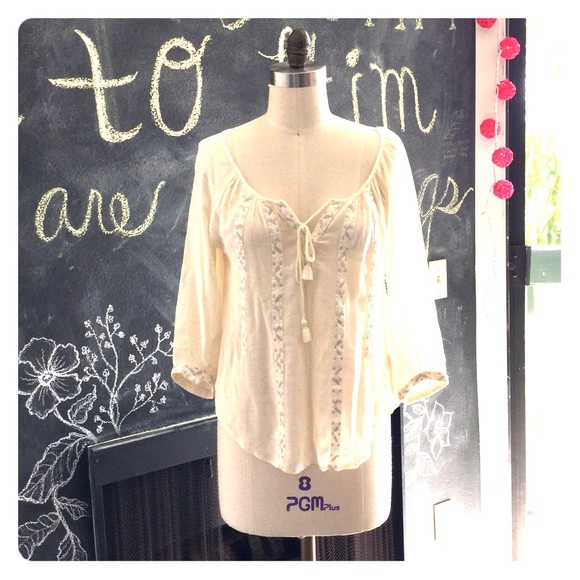 Pretty beige peasant top with silver lace details