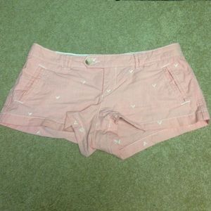 Orange and white stripped American eagle shorts