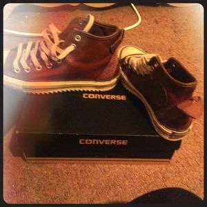 Men converse in box