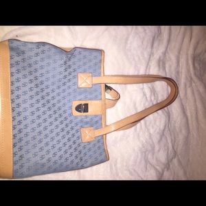 Dooney and Burk tall blue shoulder bag