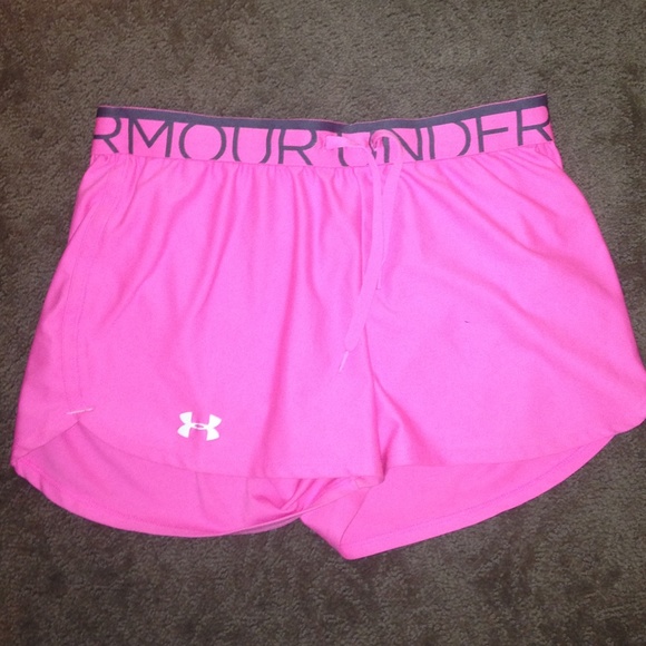 Pink Under Armour shorts.