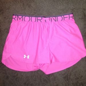 Pink Under Armour shorts.