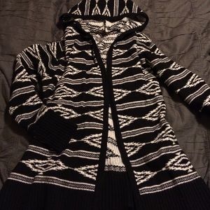 Black and white open sweater.