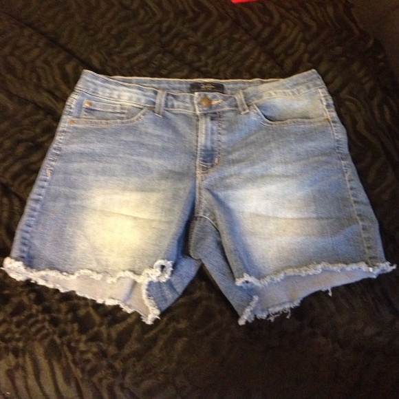 Destressed denim shorts