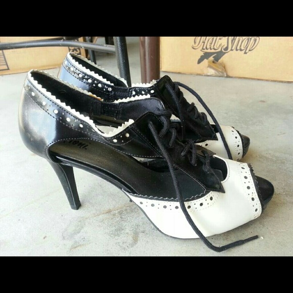 Lace up peep hole heels