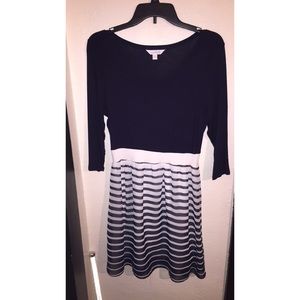 Navy blue, half striped dress.