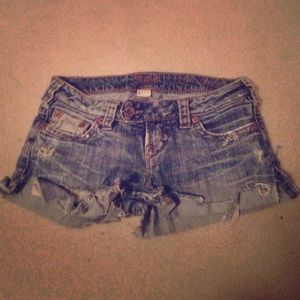 Super cute distressed Silver shorts.