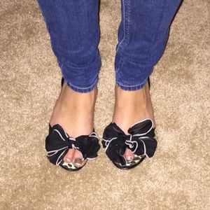 Black and white peep toe flat